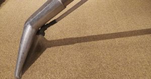 Dirty carpet being cleaned in a Montreal office building